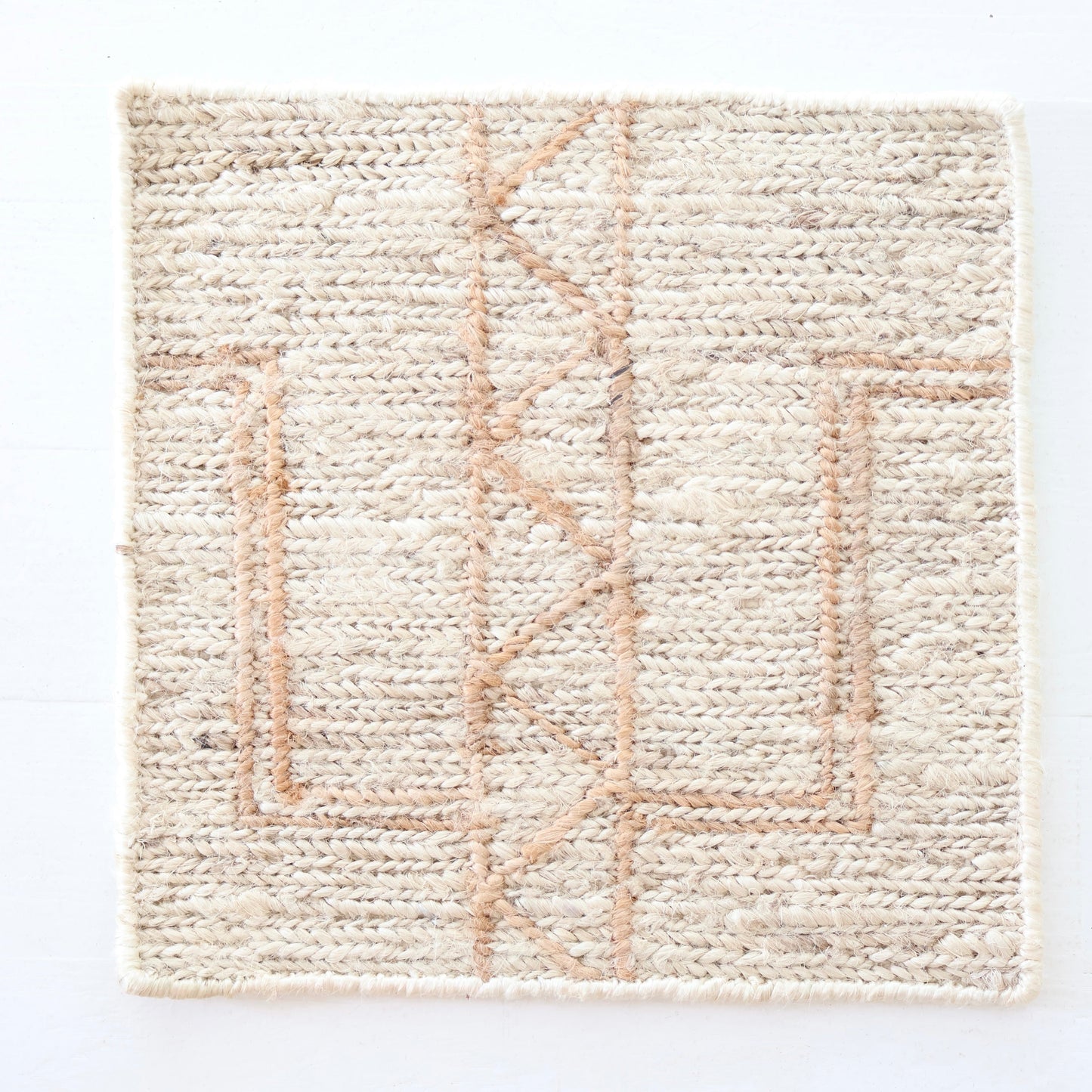 Handspun jute rug sample in ivory and sand with subtle geometric braided texture – Tess Rug Sample by Locust Lane Rugs