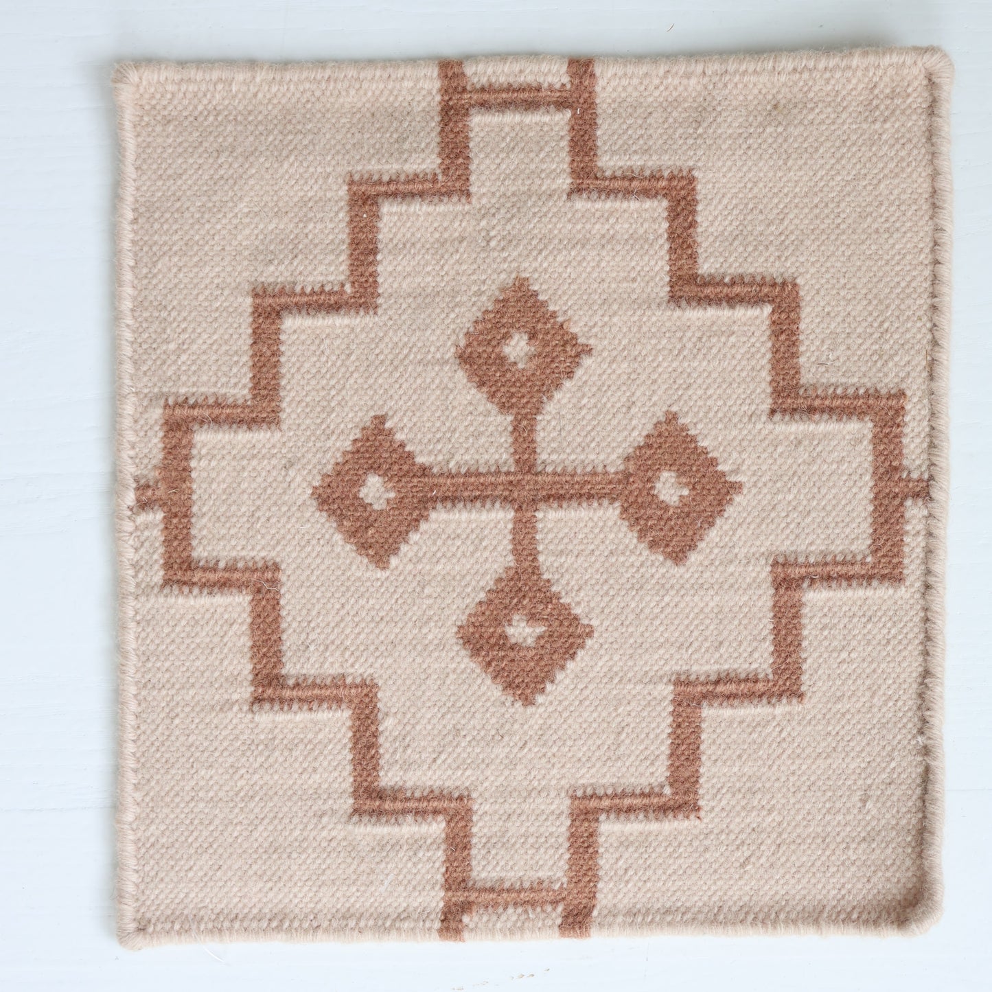 Handwoven wool rug sample in clay and cream geometric cross pattern – Orchid Flatweave Sample by Locust Lane Rugs