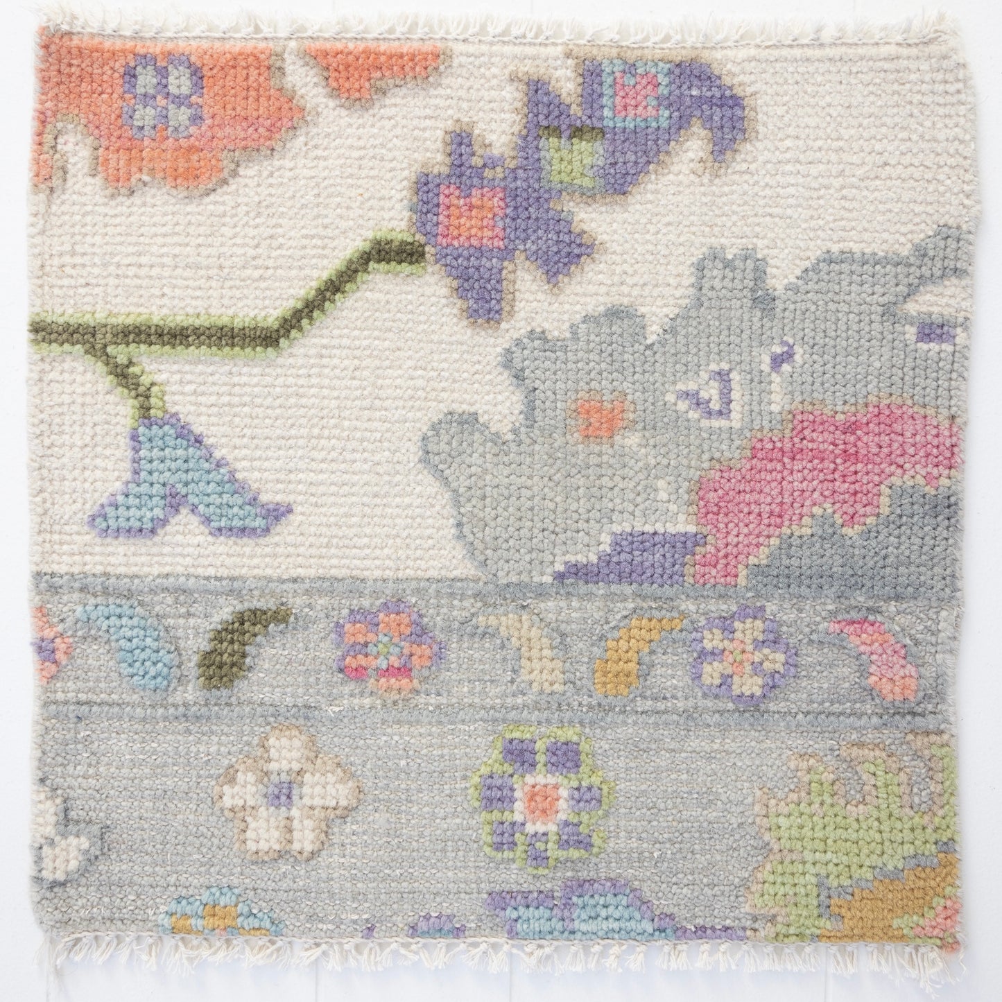 Handknotted wool rug sample in lavender, blush, sage, and ivory with floral Oushak pattern – Inez Rug Sample by Locust Lane Rugs