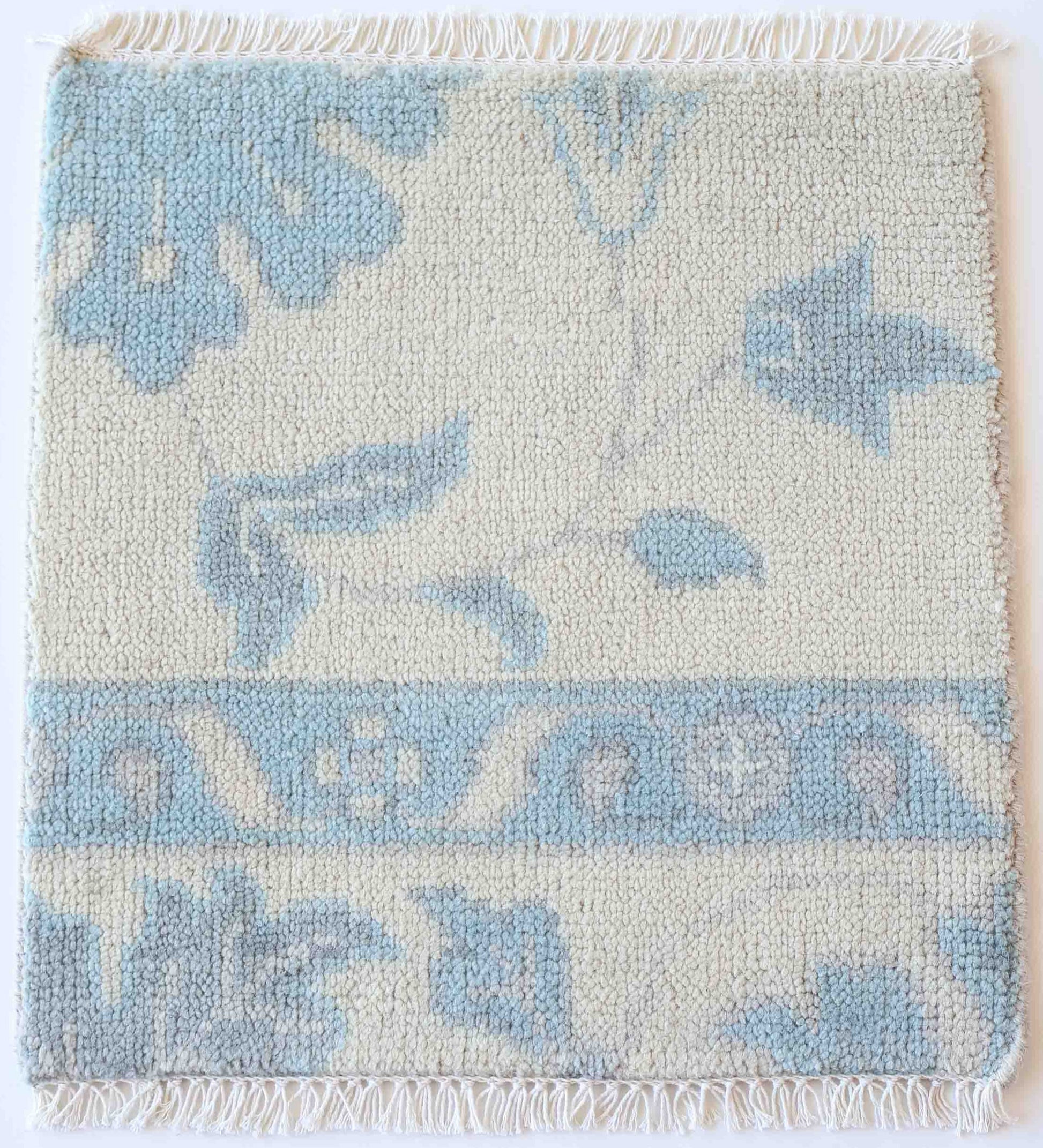 Hand-knotted Oushak rug sample in soft blue and ivory wool – Estelle Rug Sample by Locust Lane Rugs