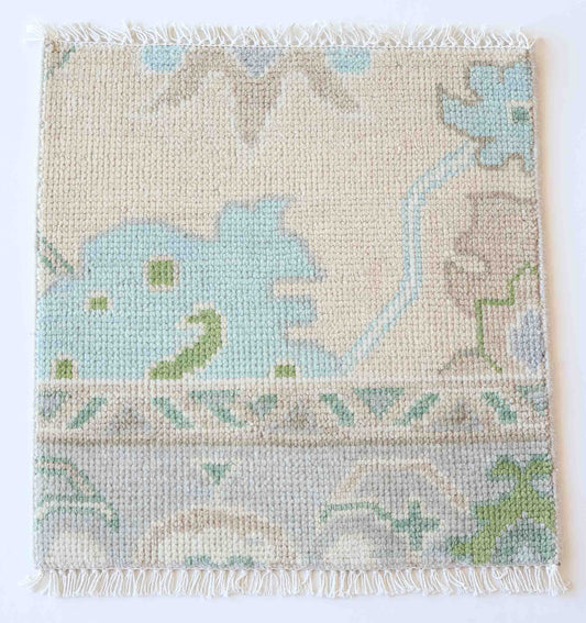 Handknotted wool rug sample in mist blue, sage, and ivory floral pattern – Fiona Rug Sample by Locust Lane Rugs
