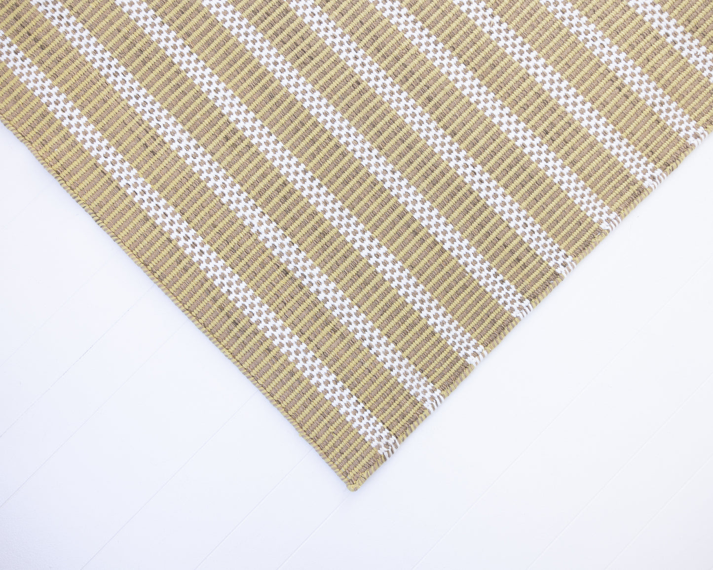 Handwoven jute and wool rug with olive green, ivory, and sand stripes – Martini Olive Jute & Wool Rug by Locust Lane Rugs