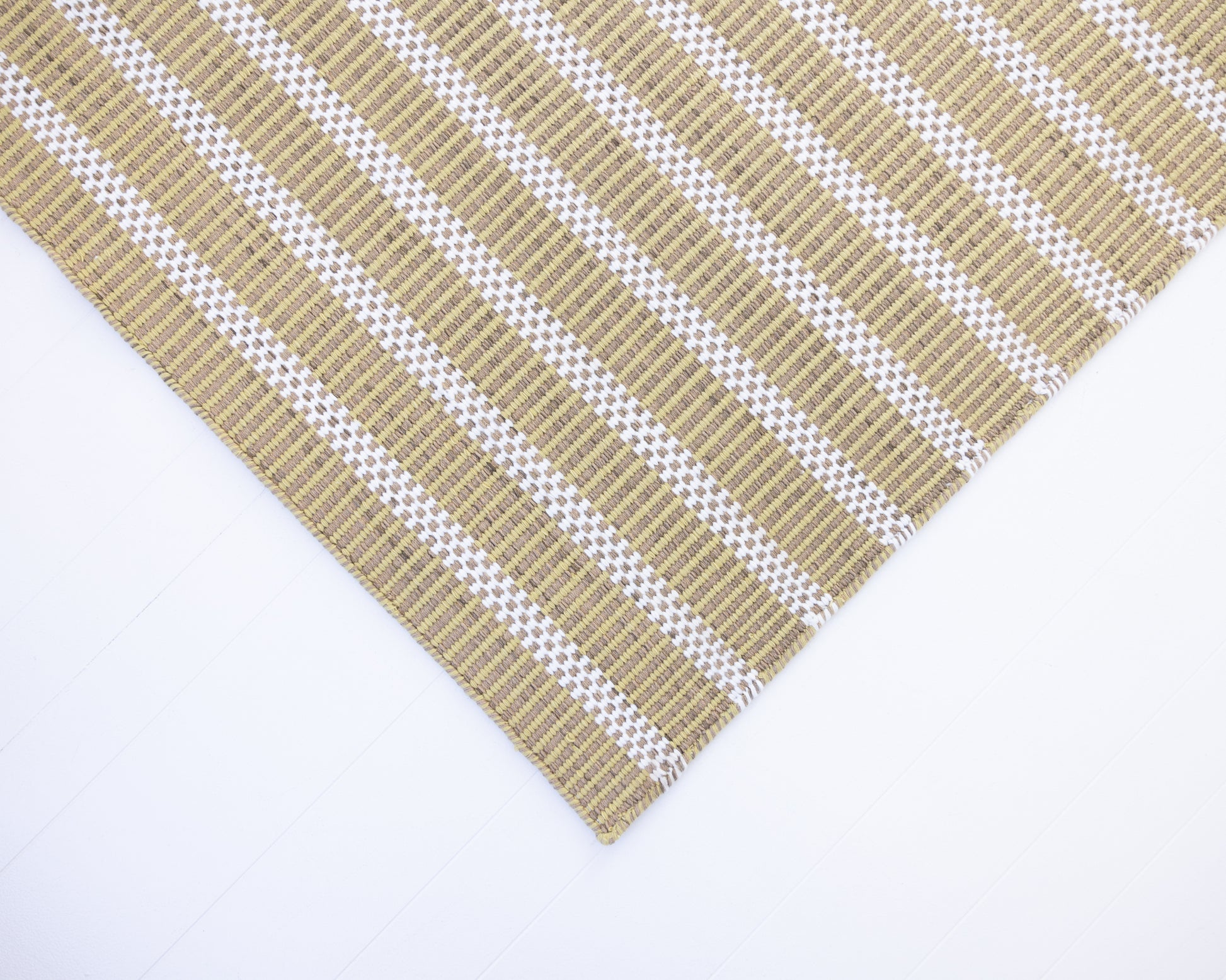 Handwoven jute and wool rug with olive green, ivory, and sand stripes – Martini Olive Jute & Wool Rug by Locust Lane Rugs