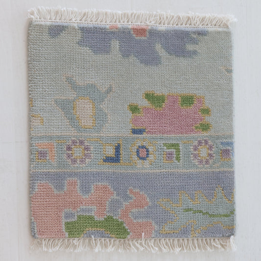 Handknotted wool rug sample in pastel blue, blush, and sage geometric floral pattern – June Rug Sample by Locust Lane Rugs