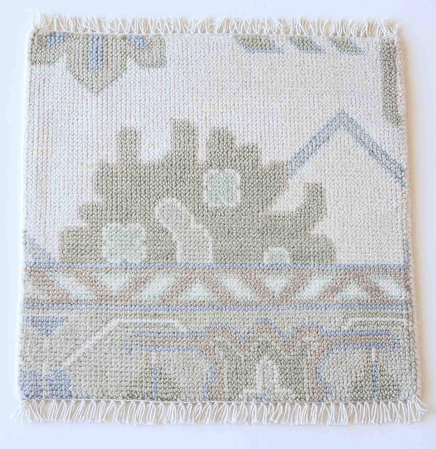 Handknotted wool rug sample in ivory, taupe, and mist blue with subtle Oushak pattern – Pearl Rug Sample by Locust Lane Rugs