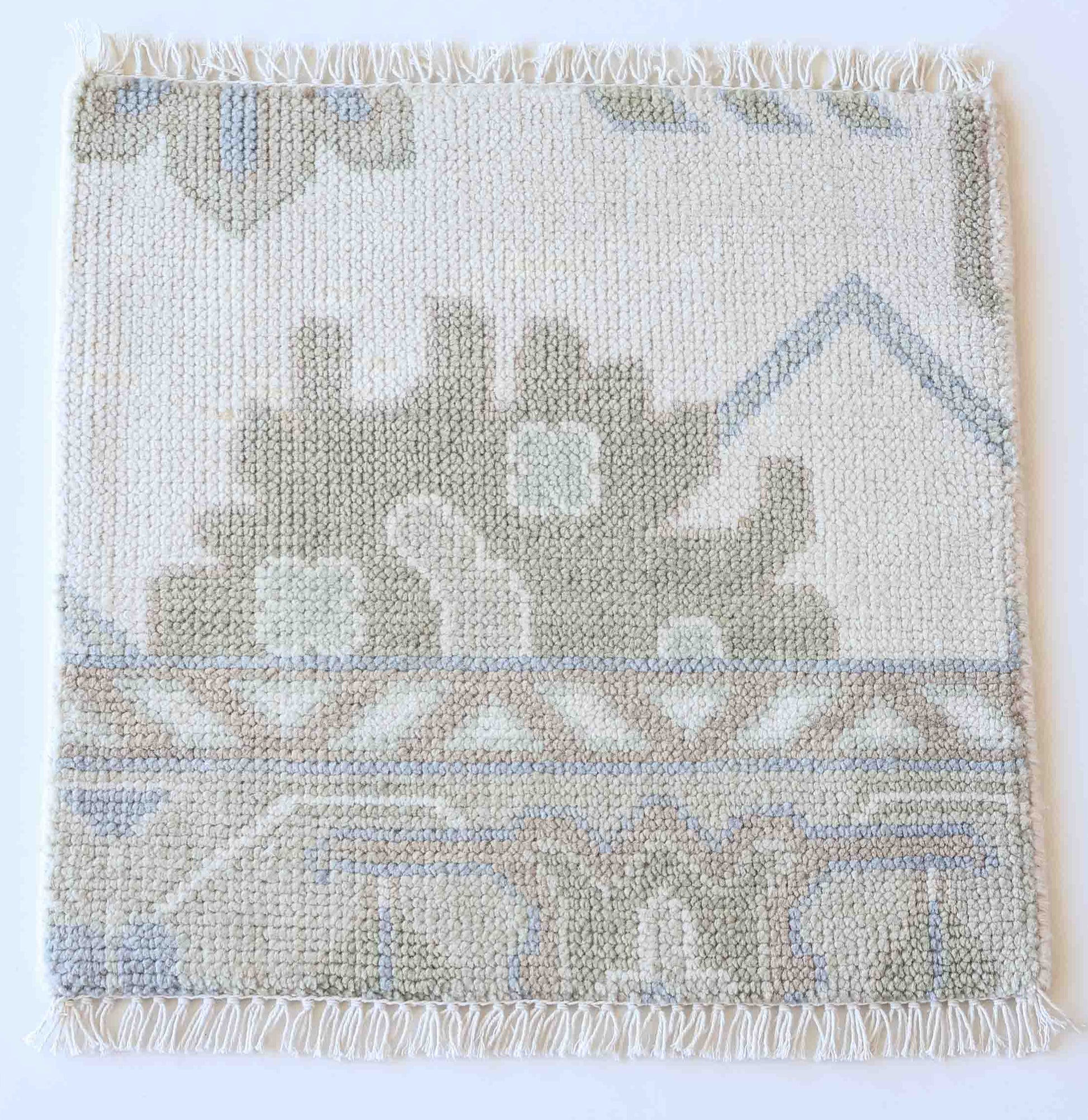 Handknotted wool rug sample in ivory, taupe, and mist blue with subtle Oushak pattern – Pearl Rug Sample by Locust Lane Rugs