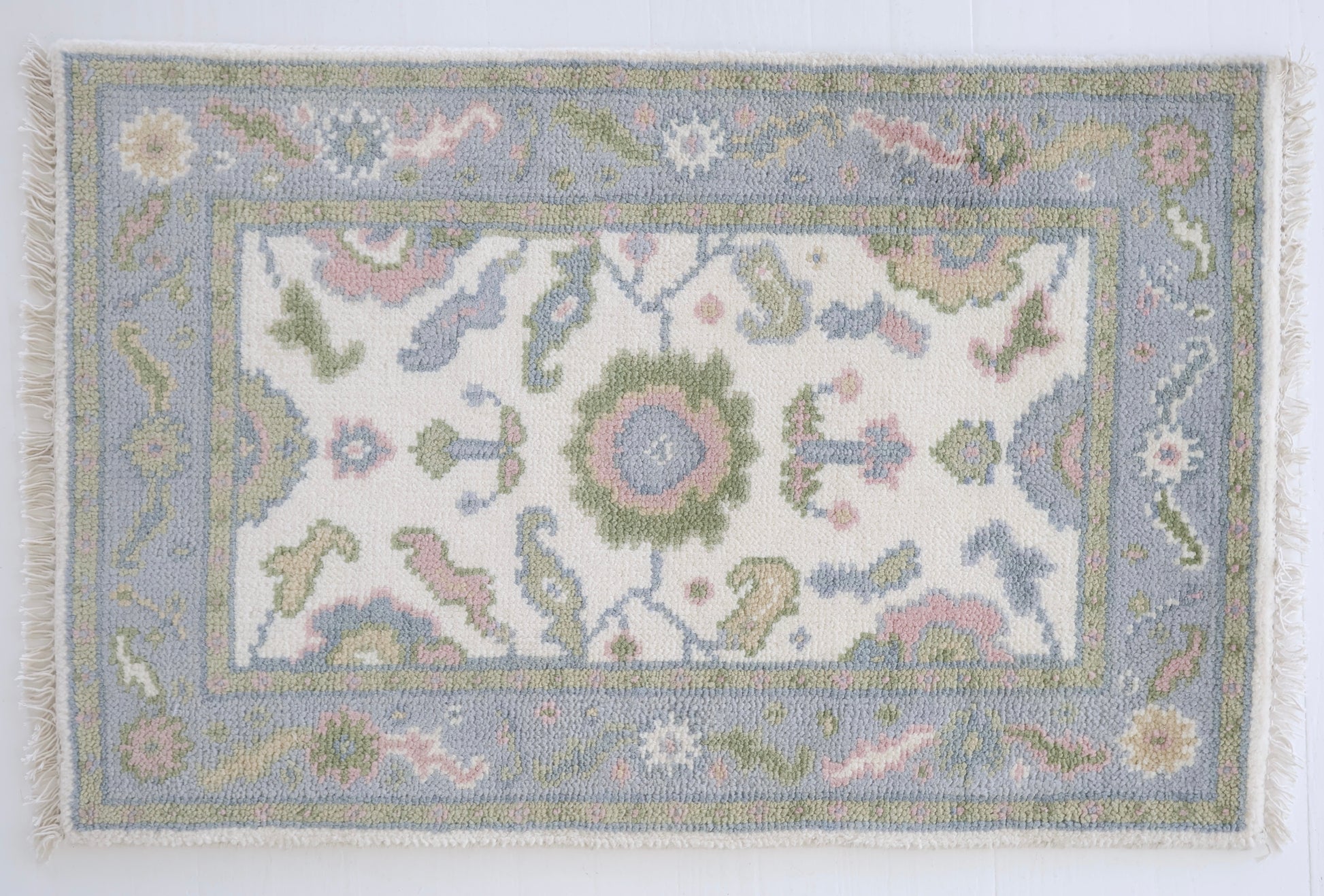 Decorative  Riley rug with intricate patterns on a white background