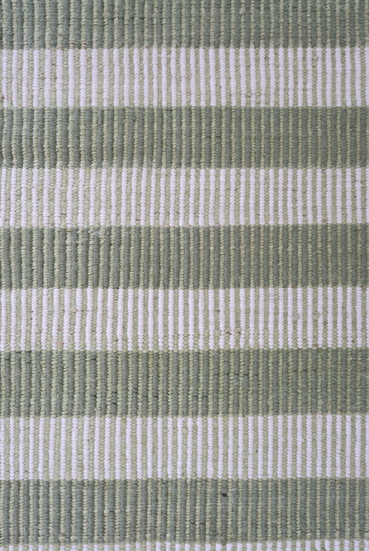 Green and ivory striped handwoven rug made from a durable jute and wool blend — Broken Stripe Green Rug by Locust Lane Rugs
