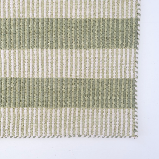 Green and ivory striped handwoven rug made from a durable jute and wool blend — Broken Stripe Green Rug by Locust Lane Rugs