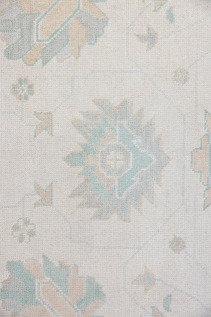 Hand-knotted wool rug in ivory with soft seafoam and sand Oushak motifs – Weezie Modern Oushak Rug by Locust Lane Rugs