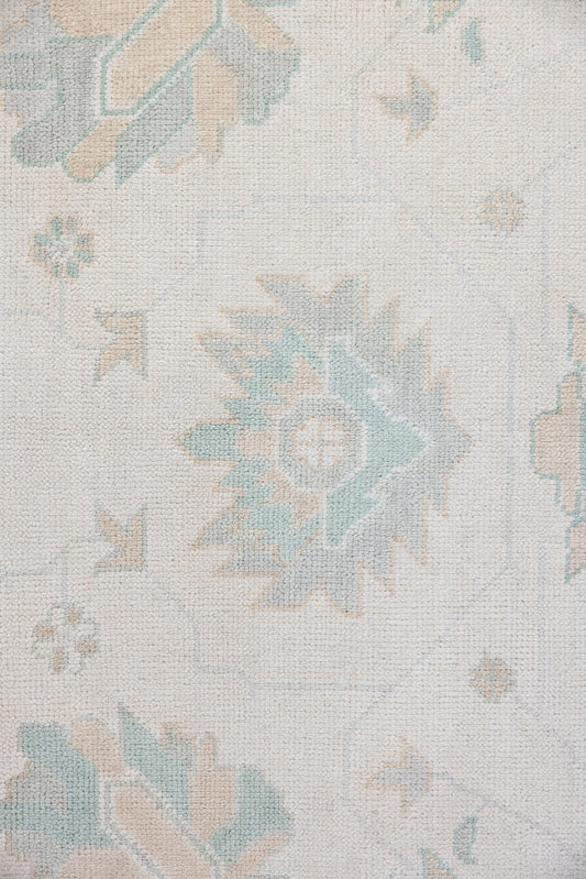 Hand-knotted wool rug in ivory with soft seafoam and sand Oushak motifs – Weezie Modern Oushak Rug by Locust Lane Rugs