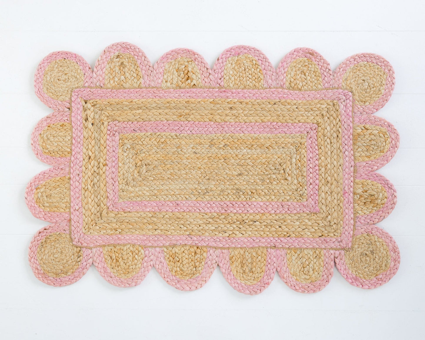 Hand-braided natural jute rug with bright pink scalloped border and rectangular center – Bright Pink Scalloped Jute Mini Rug by Locust Lane Rugs