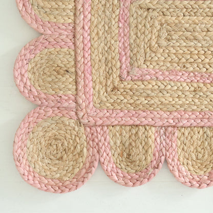 Hand-braided natural jute rug with scalloped light pink border and rectangular woven center – Light Pink Scalloped Jute Rug by Locust Lane Rugs