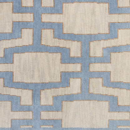 Della hand-knotted wool rug in blue, ivory, and chartreuse from Locust Lane Rugs.