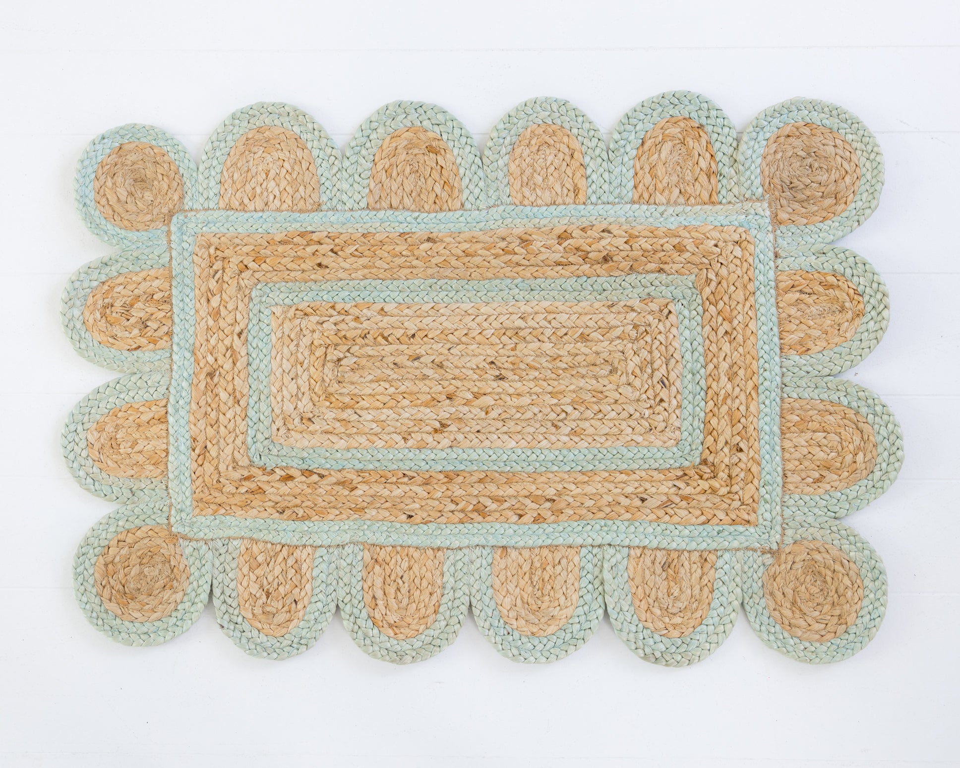 Hand-braided natural jute rug with scalloped sea blue border and rectangular woven center – Sea Blue Scalloped Jute Rug by Locust Lane Rugs