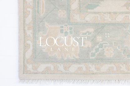 Hand-knotted wool rug in ivory with soft seafoam and sand Oushak motifs – Weezie Modern Oushak Rug by Locust Lane Rugs